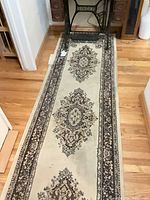 Full view of runner rug on hardwood floor