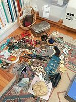 Overview of entire jewelry spread on floor