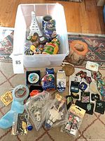 Overall view of bin with assorted souvenirs