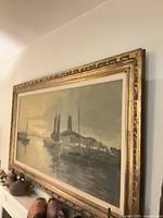 Angled view of framed maritime painting on wall
