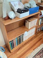 front view of bookcase with books inside