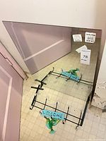 Full view of mirror with attached rack