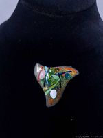 front view showing enamel design and shape