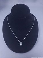 Full view of necklace displayed on bust