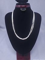 Front view of necklace on display bust