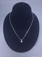 Necklace displayed on bust showing overall look