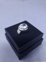 ring angled view on black box showing stone and bezel setting