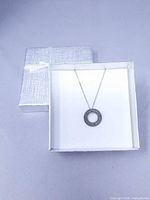 Pendant necklace displayed in gift box