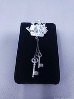 Front view showing ship shape and dangling keys