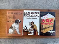 Front covers of the three Agatha Christie Crime Club hardcovers