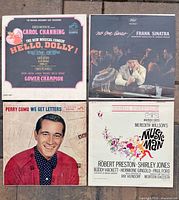 Four LP jackets: Hello, Dolly!; Frank Sinatra – No One Cares; Perry Como – We Get Letters; The Music Man soundtrack