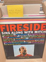 Box of Mitch Miller Sing Along LPs, top record Fireside Sing Along With Mitch visible