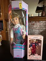 Pamela doll and Sunrise doll in their sealed boxes