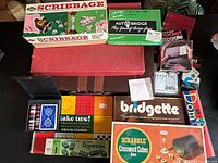 Overview of all boxed games stacked on table