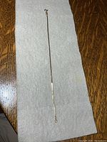 Full view of bracelet laid flat showing length and overall design