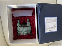 Ding vessel and wood base in velvet-lined case