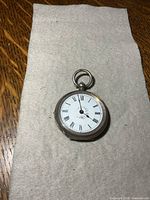 Front view showing dial and Roman numerals