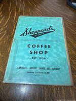 Full view of menu cover on table