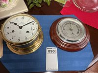Clock and barometer side by side for scale and overview