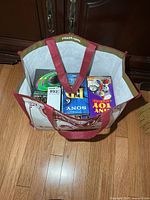 Bag with visible Sony blank tapes and Toy Story VHS tape