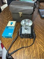Kodak Brownie Starflash camera, case, flashbulb box