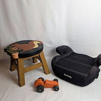 Group shot showing stool, booster seat, toy car