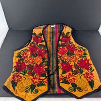 Full vest front showing embroidery and tag