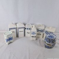 Group shot of all seven blue and white ceramic pieces