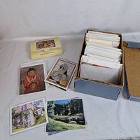 Entire lot showing shoebox filled with cards, unopened Teddy Bears notelets pack and five loose cards