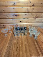 Group shot showing all glassware: Hellerware glasses, Indiana goblets, Bryce coupes
