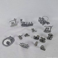 Group shot of all pewter figures displayed