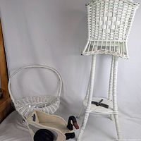 Group view of plant stand, basket, goose toy, dragonfly