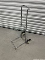 Side view of foldable metal dolly
