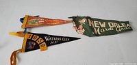 All three felt pennants laid out flat