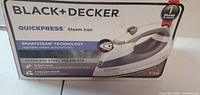 Front of Black+Decker QuickPress steam iron box