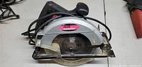 Front view of Drill Master circular saw showing blade and guards