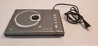 Top view of silver Durabrand DVD player showing disc tray and control buttons