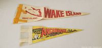Front view of Wake Forest and Anchorage Alaska pennants