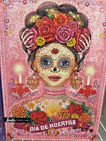 Front of illustrated Dia de Muertos Barbie box
