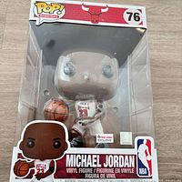 Front view of boxed Michael Jordan #76 Funko Pop with Foot Locker exclusive sticker