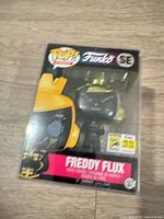 Front view boxed Freddy Flux SE with Comic-Con 400 pcs sticker
