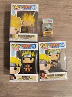 Front view of three Pop Animation boxes (#71, #181, #186) and Kakashi Pocket Pop box