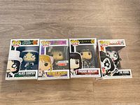 All four boxed Funko Pop! Rocks figures lined up