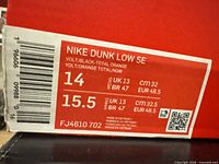Size label on original Nike box showing model FJ4610-702 and size 14