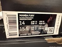 Manufacturer label on box showing model, size, color code