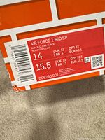 Box label showing model, colour, size US 14, style code D06290-001