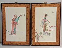 Both framed paintings front view