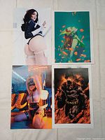 All four prints laid out to show subjects and size