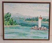 Full view of framed lighthouse painting