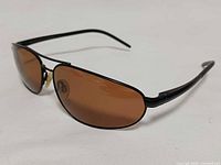 Three-quarter front view showing frame style and lens tint